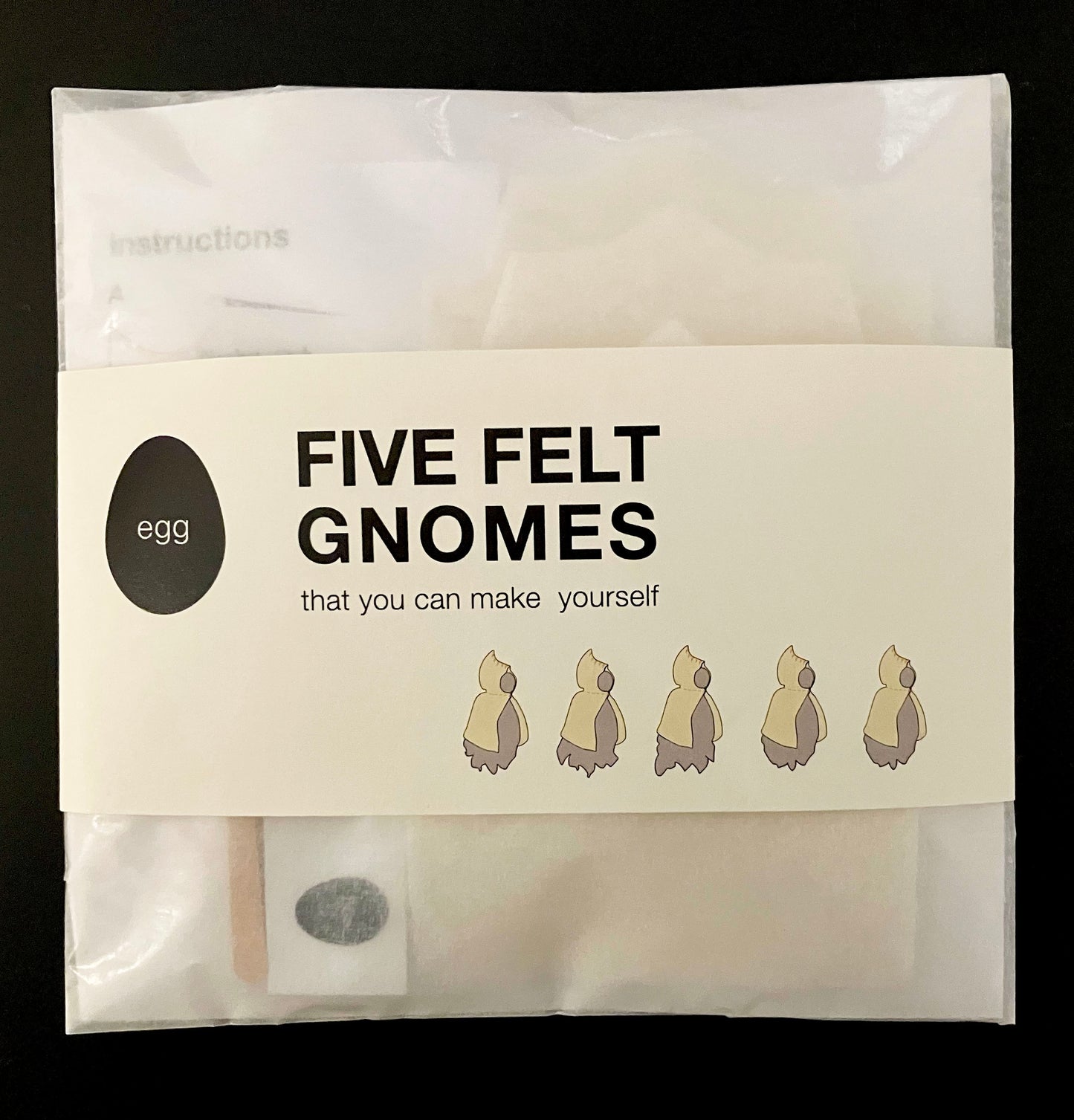 O. Five White Felt Gnomes
