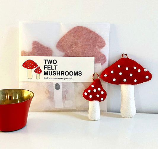 A. Two Felt Mushroom Ornaments